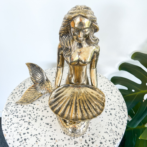 KREA - ornate sculpture of a shapely mermaid made of crystal and